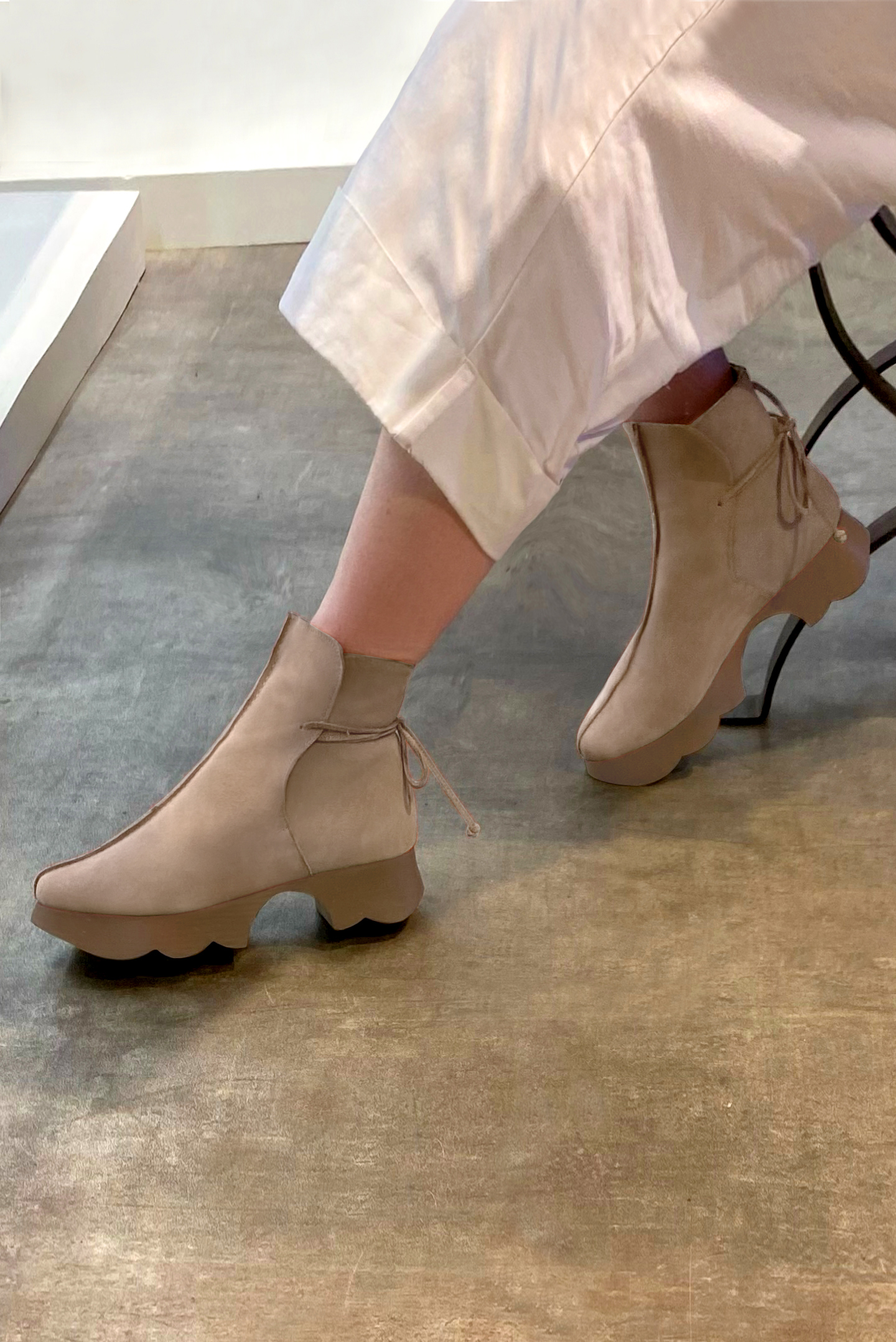 Tan beige women's ankle boots with laces at the back.. Worn view - Florence KOOIJMAN